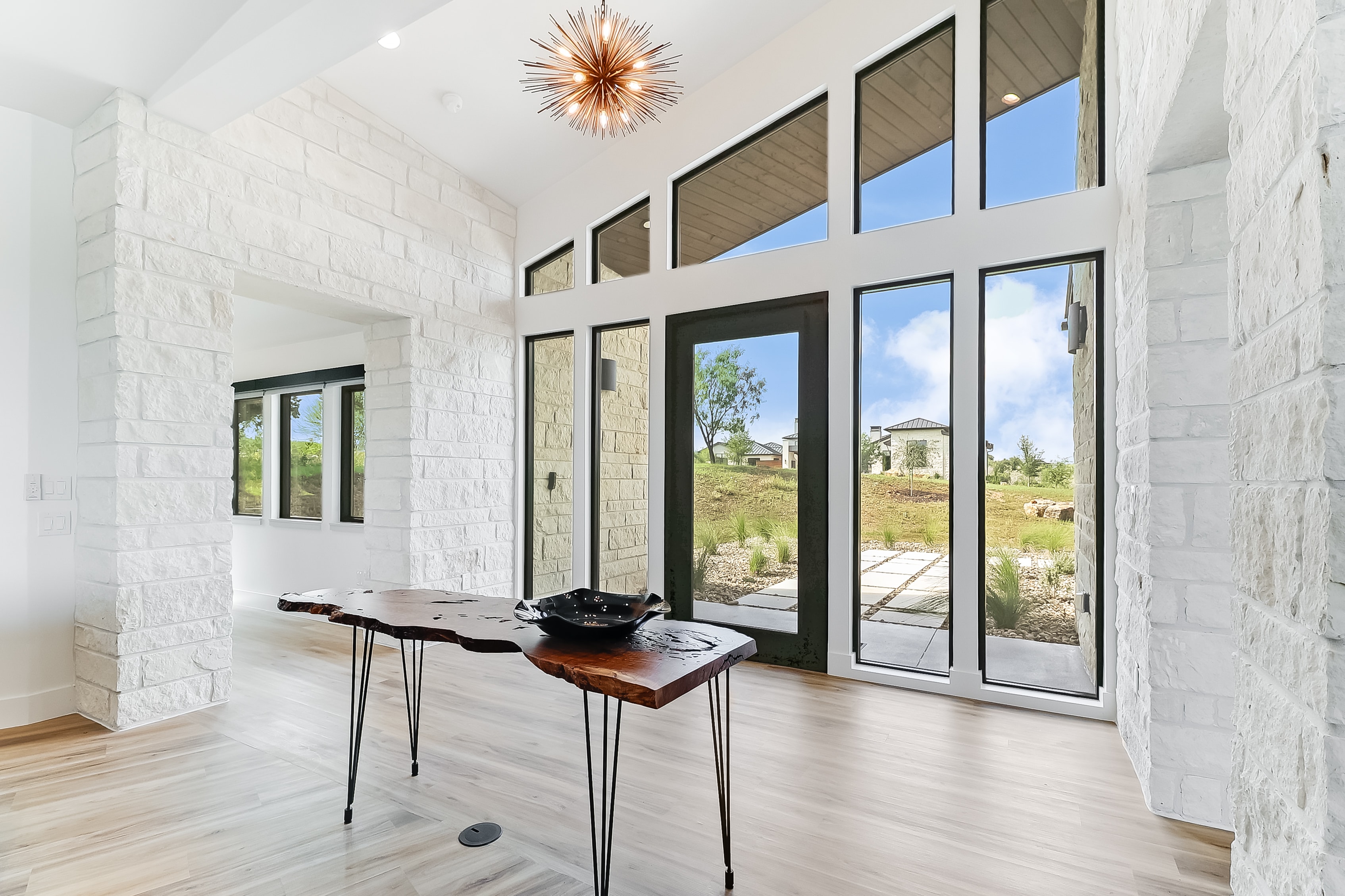 Architectural interior moment with soaring windows and white stone, The Architect's View