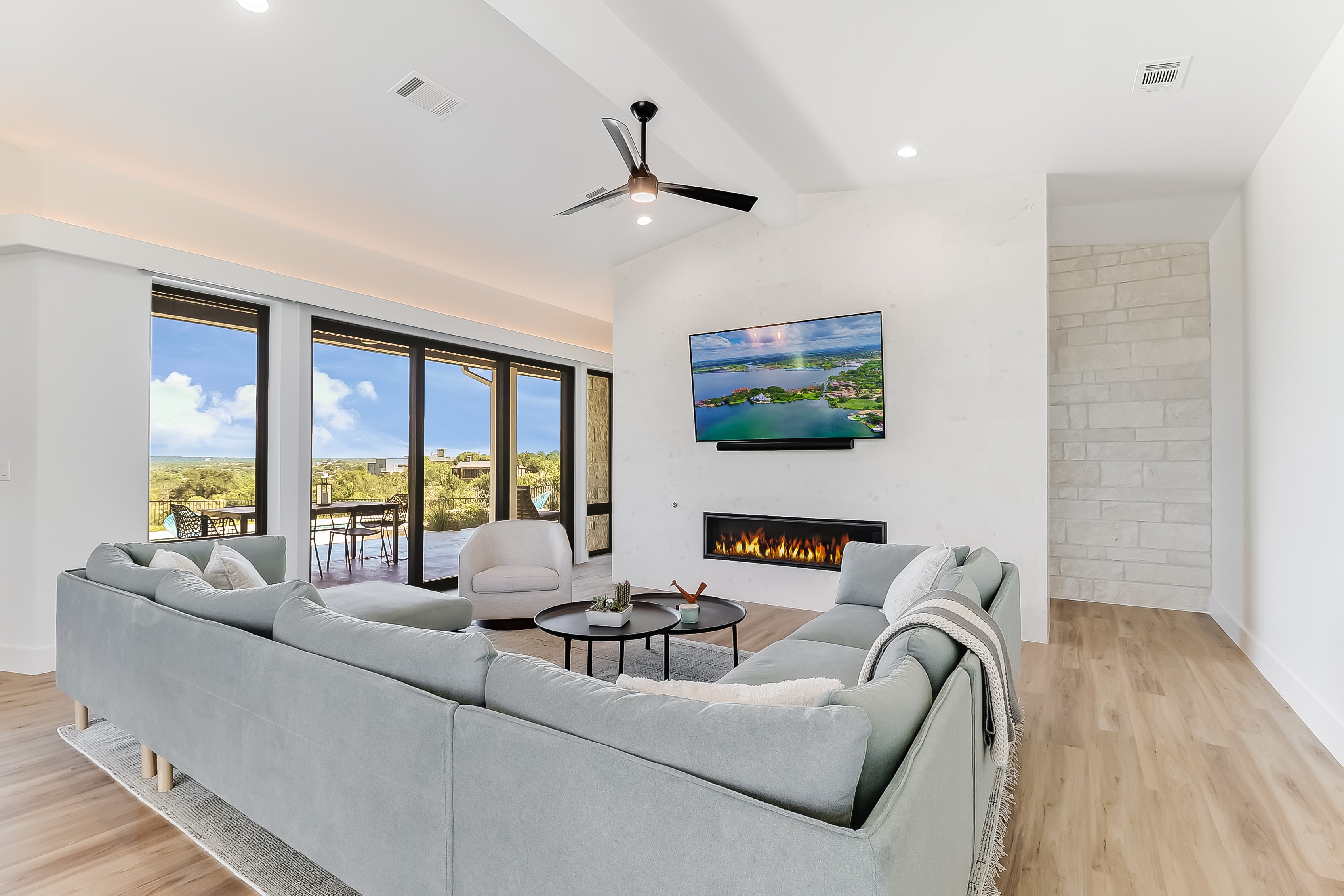 Great room with Hill Country views and linear fireplace, The Architect's View