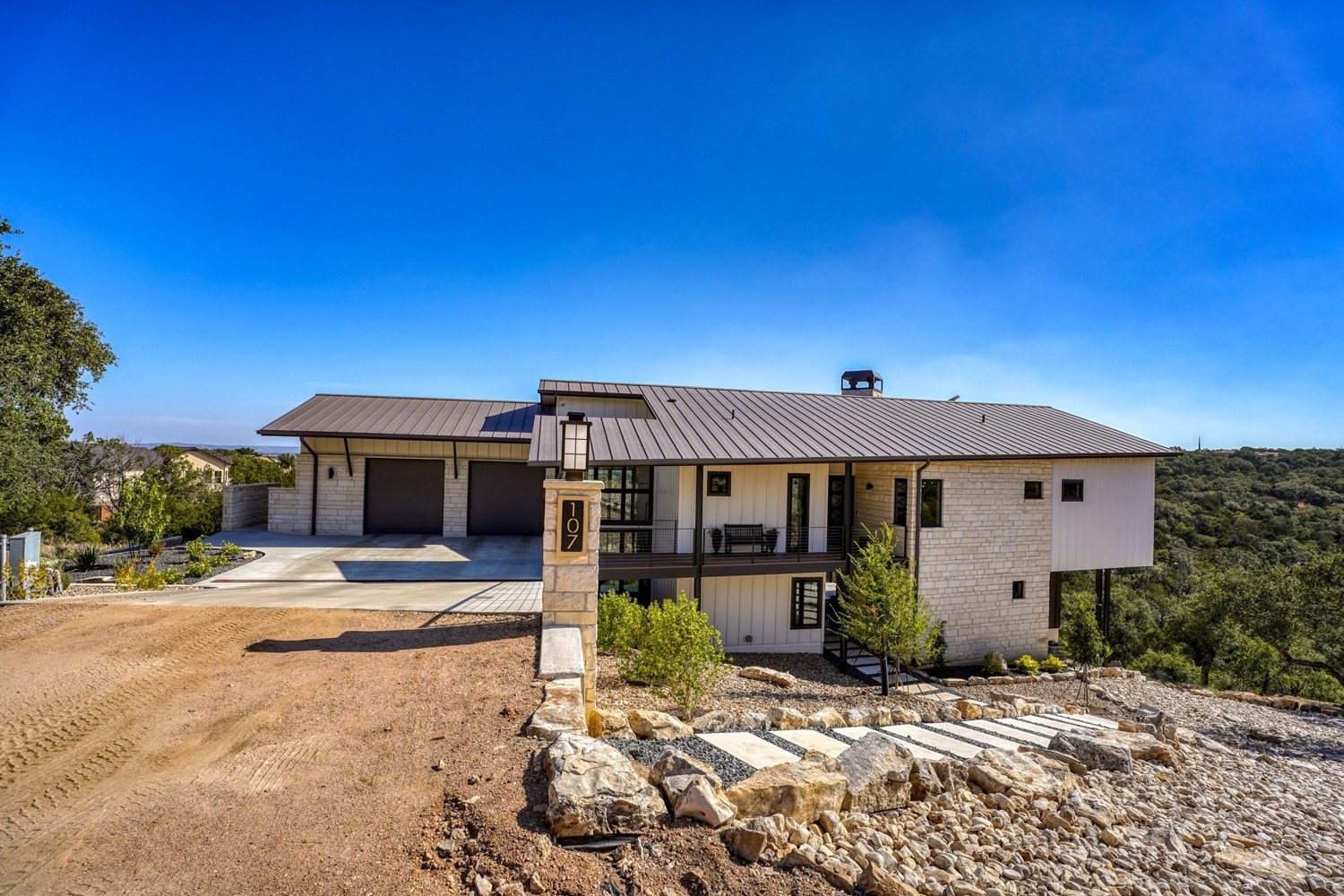 Hill Country Contemporary home on a steep Horseshoe Bay lot by Grubbs Construction