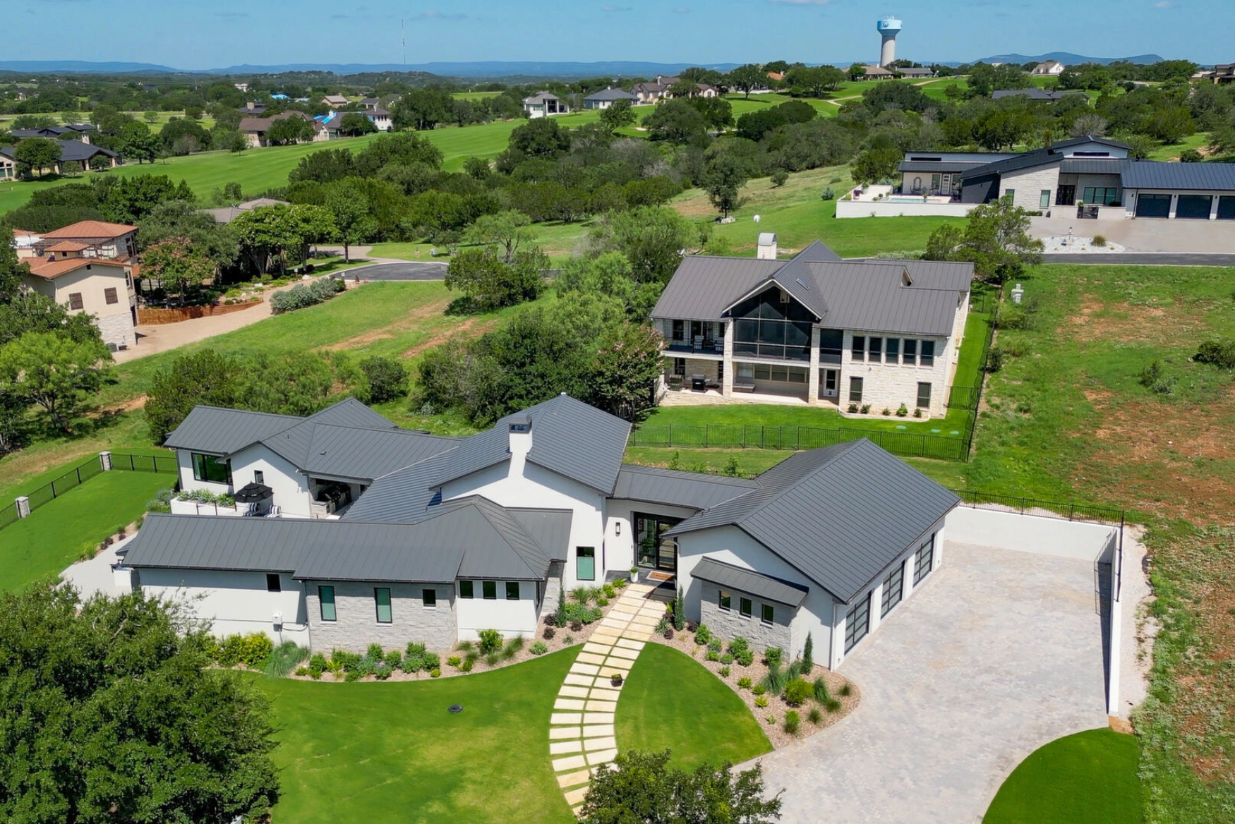 Outdoor living area at a custom golf-course home in Horseshoe Bay — Grubbs Construction